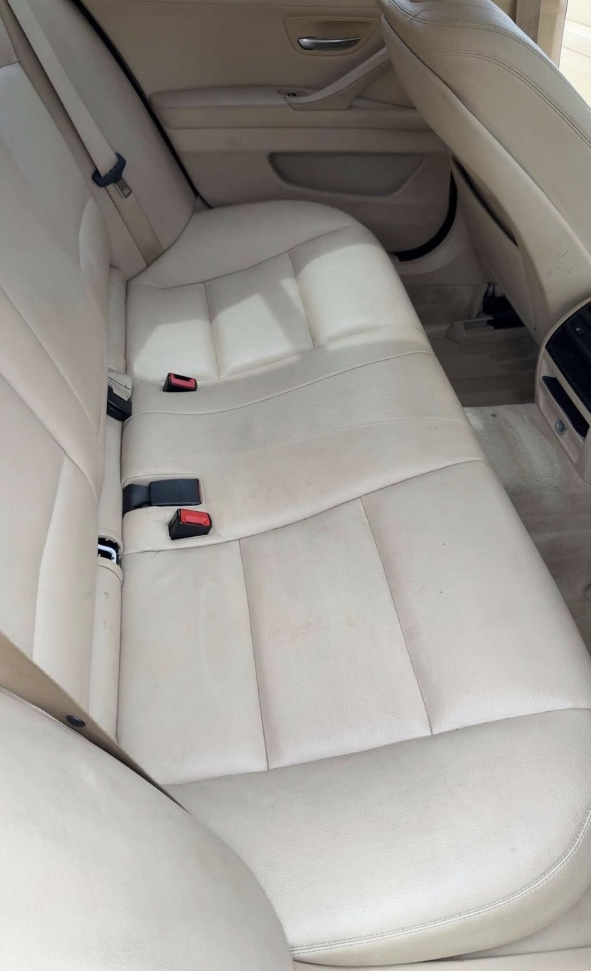 Beige leather rear car bench seat