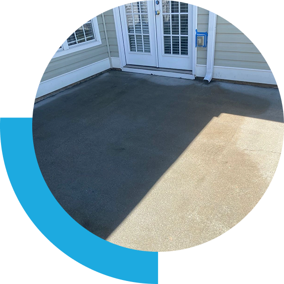 Concrete patio outside glass double doors